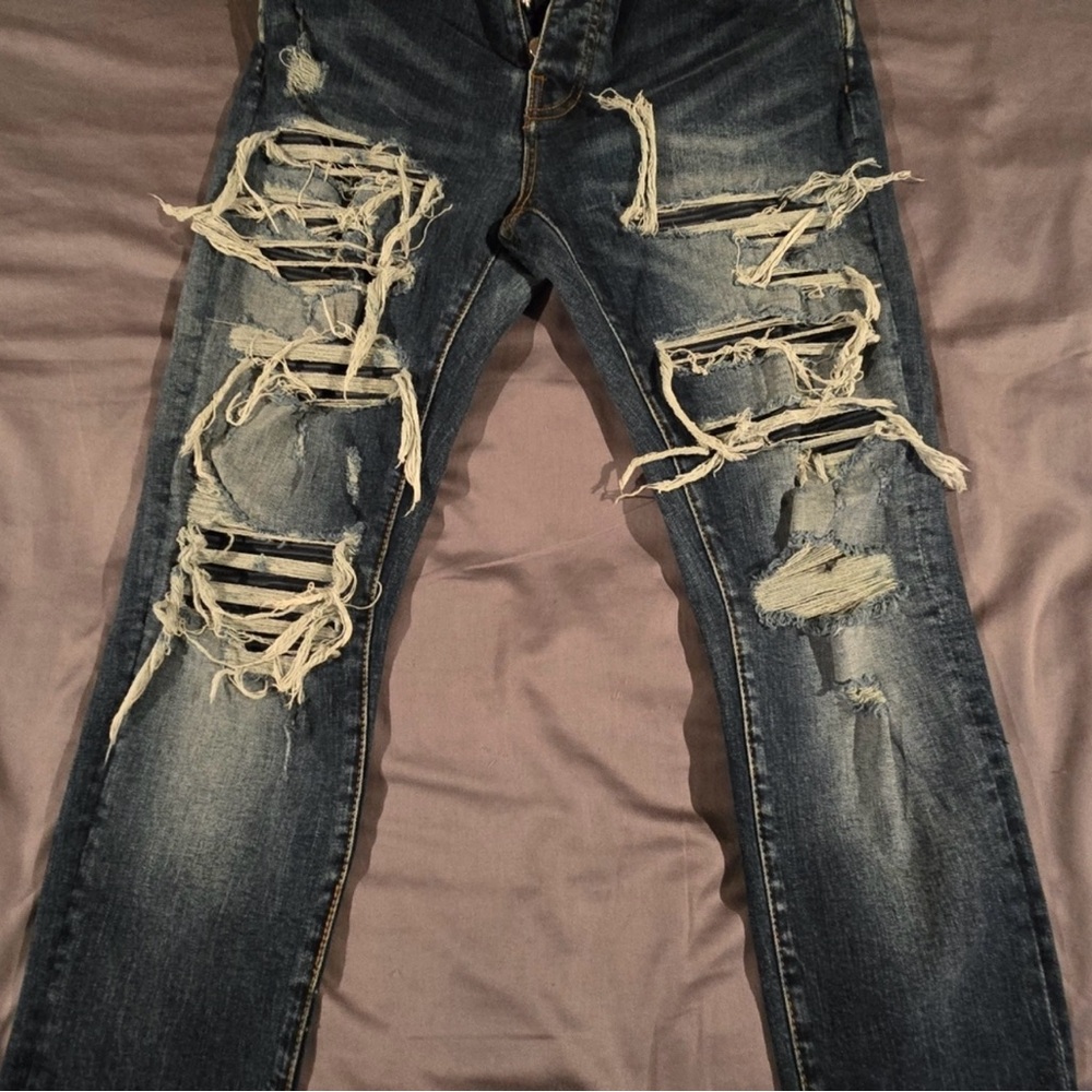 AMIRI Distressed Blue Skinny Jeans